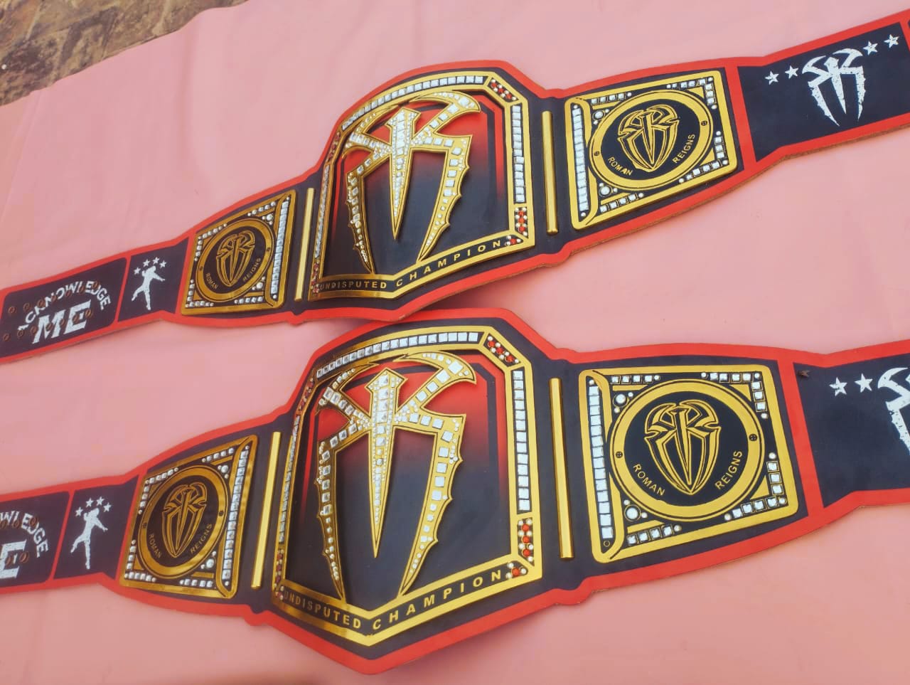 Undisputed Champion Title , Roman Reigns Title
